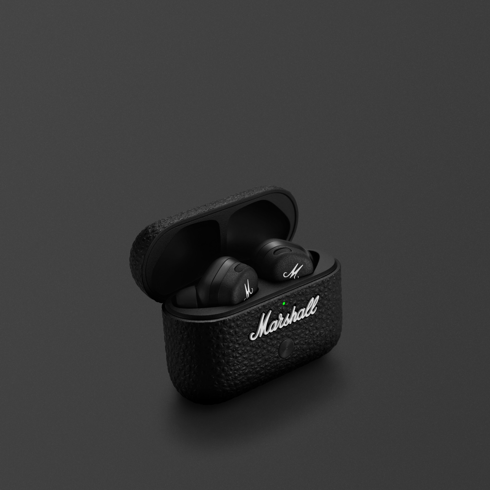 The Marshall MOTIF II A.N.C. BLACK earphones with a gold case.