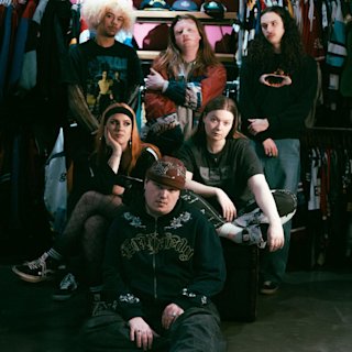 'Knives' posing for a band photoshoot