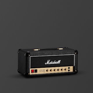 A black Marshall Studio Classic guitar amplifier head with a brass control panel sits against a plain dark background.