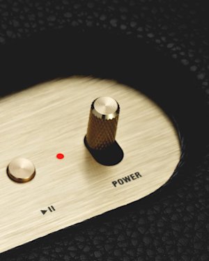 The power lever on top of an Acton II Bluetooth speaker.