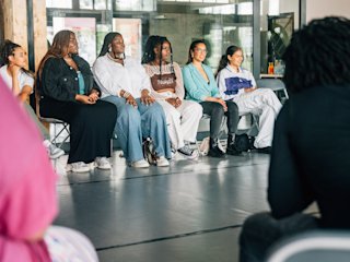 People sitting in the Roots Berlin office.