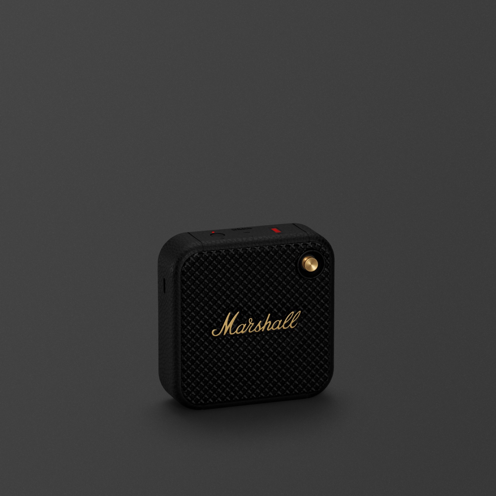 Marshall Willen black and brass speaker - black. This wireless speaker is the perfect portable companion, providing exceptional sound quality in a sleek black design.