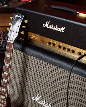 Marshall's Origin50 Head and a guitar.