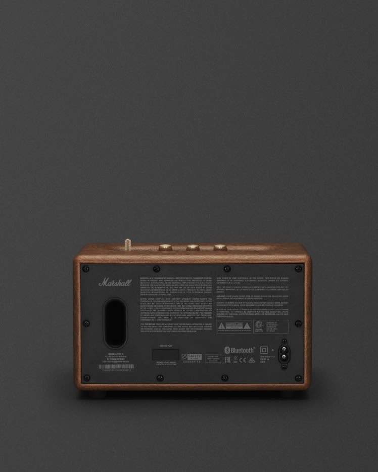 An image of a small Marshall Acton III Brown speaker on a black background.