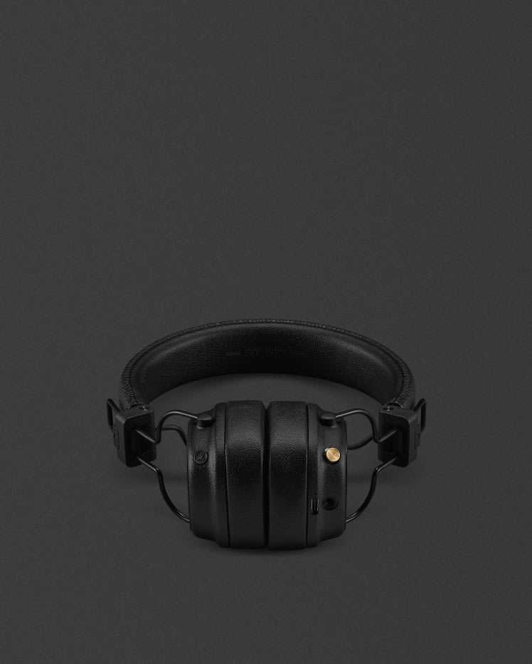 Front view of folded Marshall Major V Black on-ear headphones.