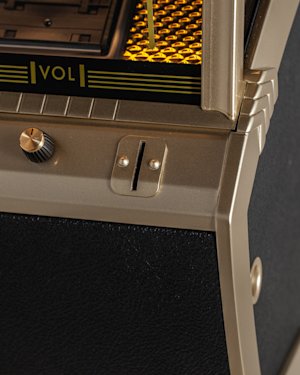 Opening for coins on the Marshall Jukebox