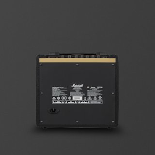 Back view of a Marshall CODE25 guitar amplifier showing control knobs, model information, safety labels, and power input against a plain dark background.