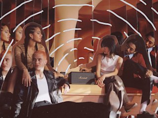 People gathered around a Marshall Homeline III speaker.