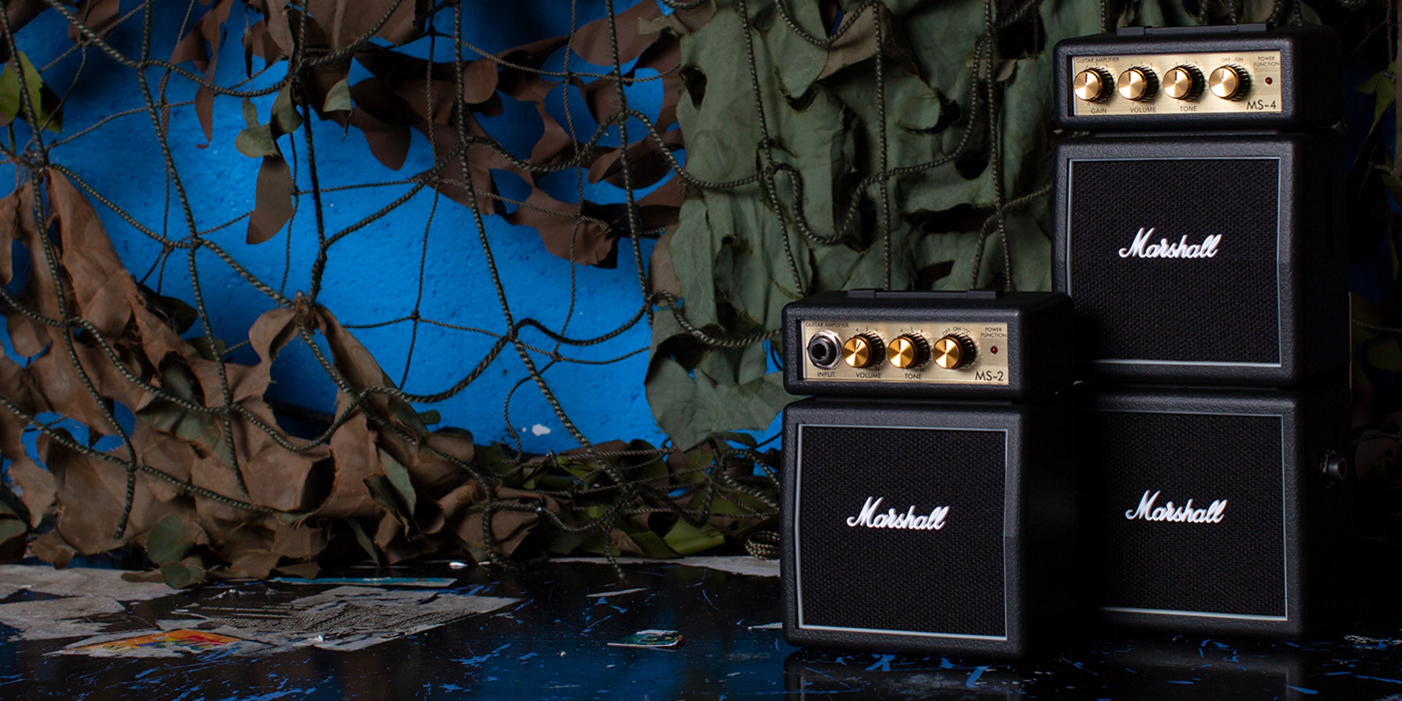 Two black micro stacks from Marshall amplifiers side by side