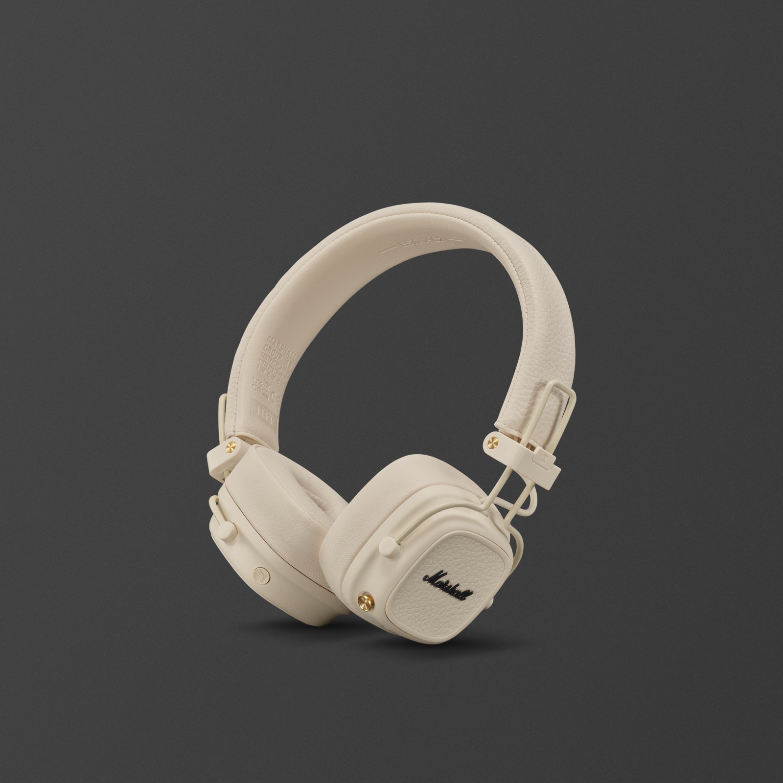 Casque supra-auriculaire Marshall Major V Cream sur fond gris.