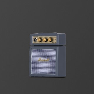 A gray and brass Marshall portable guitar amplifier with volume, tone, and overdrive knobs, against a plain dark background.
