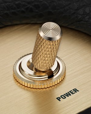 The power switch on top of a Marshall Stanmore III speaker.