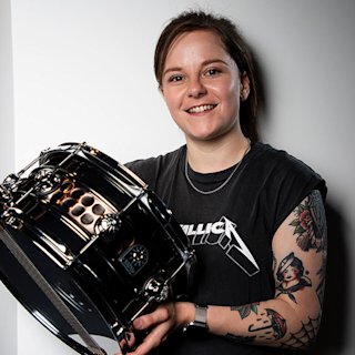 Georgia Challinor posing for Natal drums