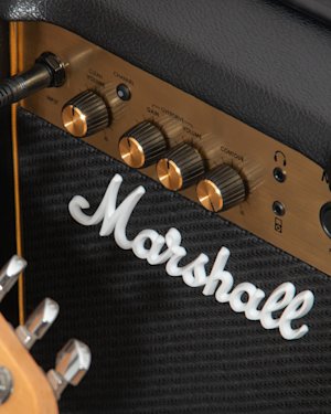 Marshall's MG10 Combo with a guitar