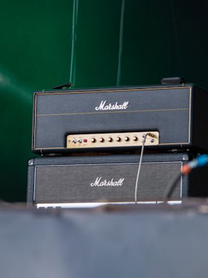 Marshall 1959 Handwired Heads on top of a Marshall amp on stage