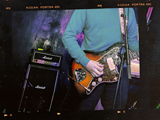 GIF showing different shots of the Marshall Studio Classic Head with a man that plays a guitar.
