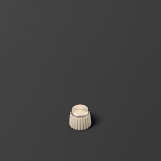 A spare part knob in cream for Acton IV flat