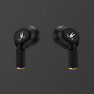 A pair of black Marshall Motif II A.N.C. wireless earbuds with textured stems, brass accents, and a white "M" logo on each earbud, set against a dark background.