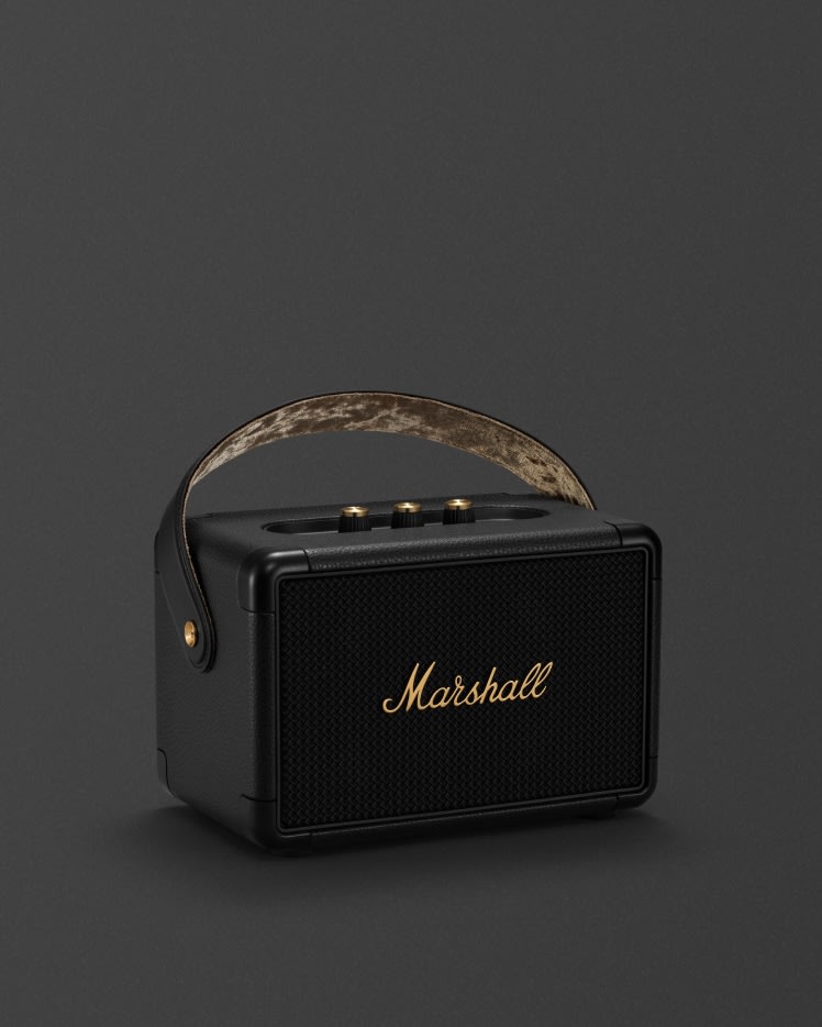 Kilburn II Black and Brass, a Marshall bluetooth speaker in black with a leather strap.