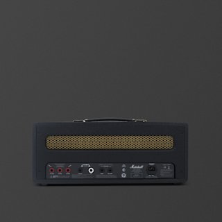 A black Marshall Origin50 guitar amplifier head with a brass mesh front and various input, output, and control jacks on the back panel, set against a plain dark background.