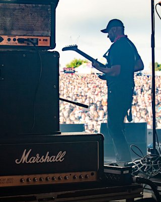 A Marshall amplifier in use during a performance in a music festival