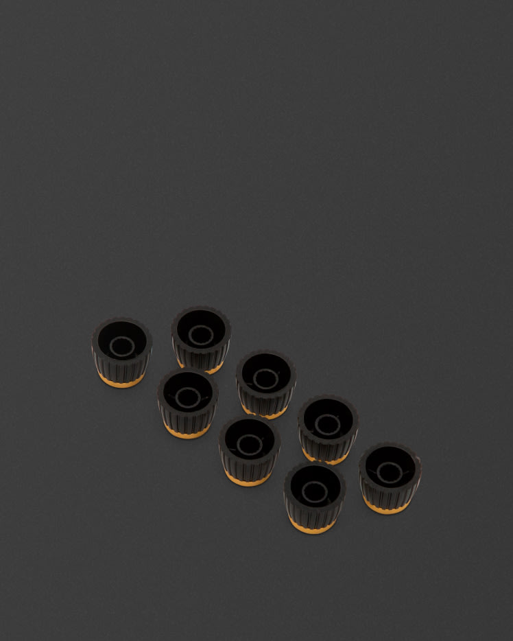 Botones con cuerpo marrón y tapa dorada.