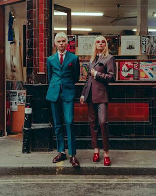 The Molotovs posing in front of a record store