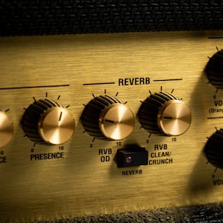 A close up of a Marshall JVM205 Head amplifier.