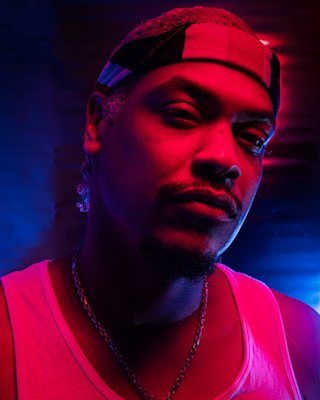 Kid Bookie under a red light.