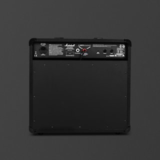 The rear view of a black Marshall MG50GFX guitar amplifier combo showing various input and output ports, switches, and labels on a dark background.