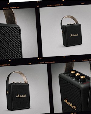 Marshall's black Stockwell II speaker with gold knobs and a handle.