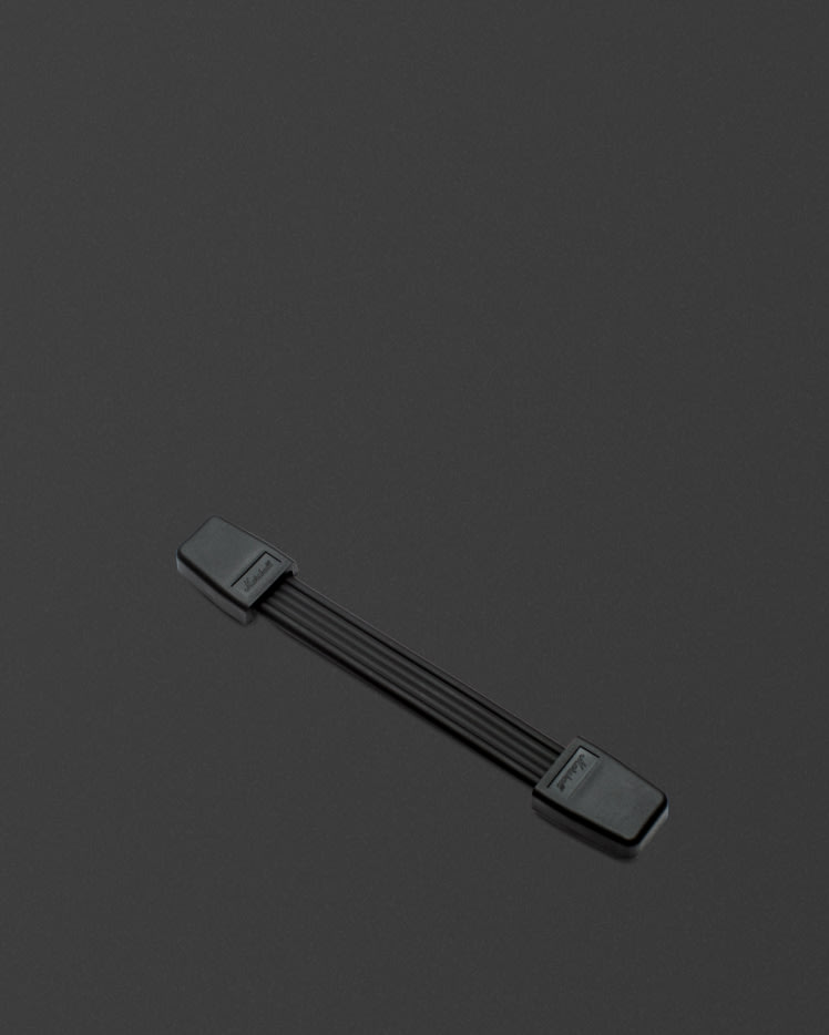 Black rubber strap handle.