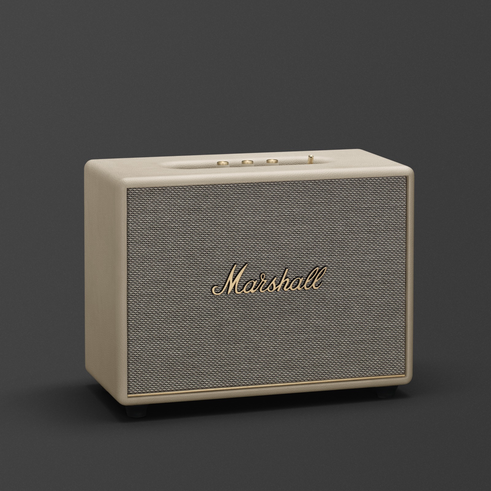 Enceinte Bluetooth Marshall Woburn III Cream. Cette enceinte Marshall, également disponible en blanc, est le modèle Woburn III Cream.