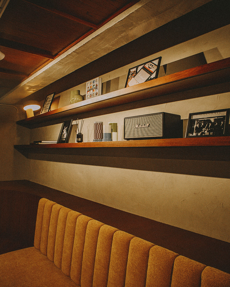 A couch in the corner of the Marshall Livehouse Bankok