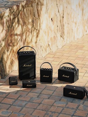 Marshall's black speakers on an outdoor staircase.