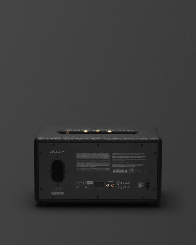 A black Marshall Stanmore II Bluetooth speaker on a grey background.