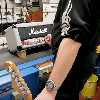 Marshall factory workers testing the studio head amplifiers