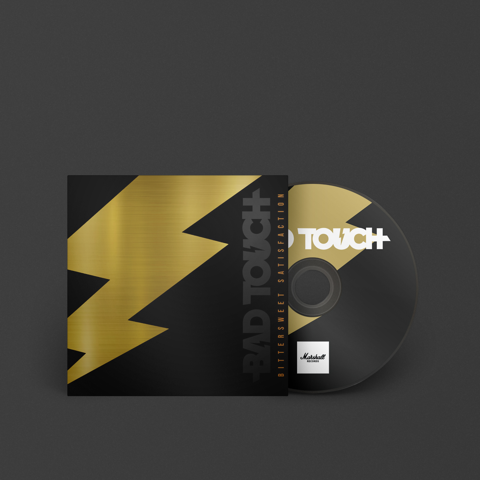 A black CD with a gold streak could be Bad Touch's Bittersweet Satisfaction, under the Marshall label.