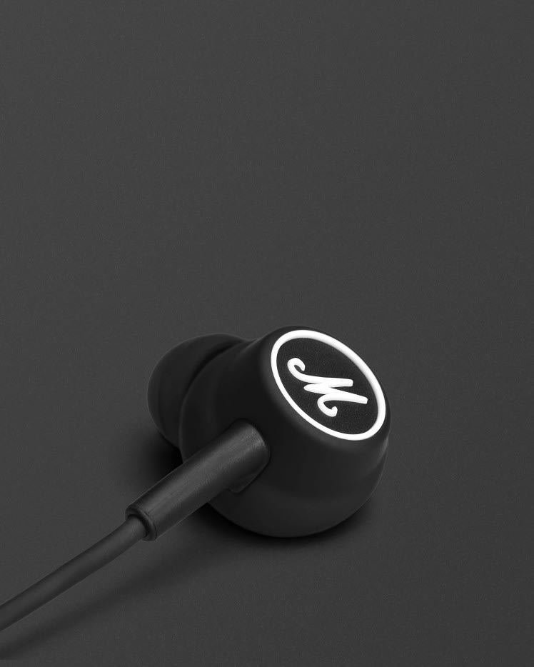 Mode black headphones with white logo in the back
