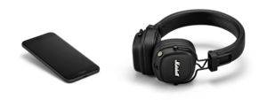A pair of Marshall MAJOR IV headphones and a Marshall phone placed side by side.