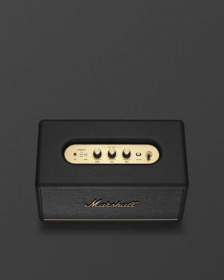 The Marshall Stanmore III Black speaker in gold is a stylish home speaker equipped with Bluetooth technology.