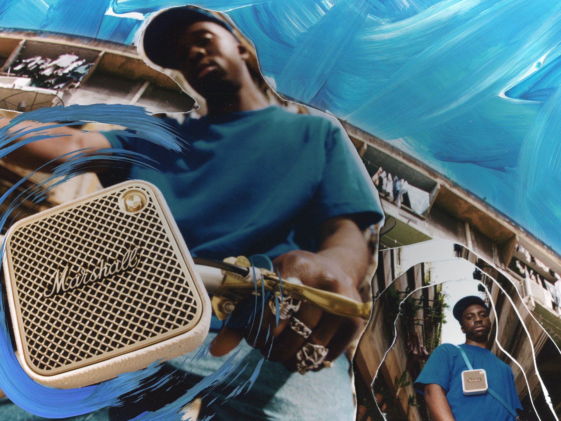 Kelvin Krash s'appuie sur un vélo avec l'enceinte bluetooth portable Marshall Willen II Cream.