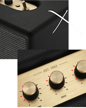 A Marshall Acton III Bluetooth home speaker in black and gold, featuring its gold knobs.