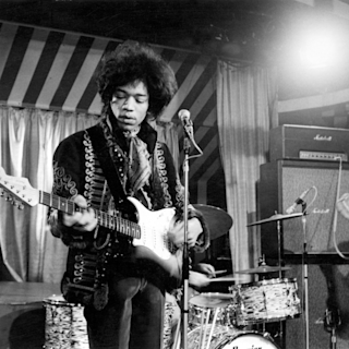 Jimi Hendrix playing guitar