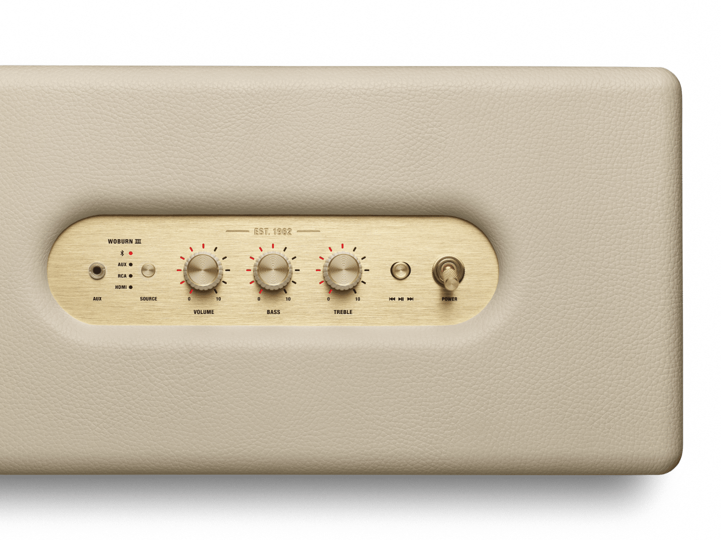 The front of a beige Marshall WOBURN III amplifier with buttons on it.