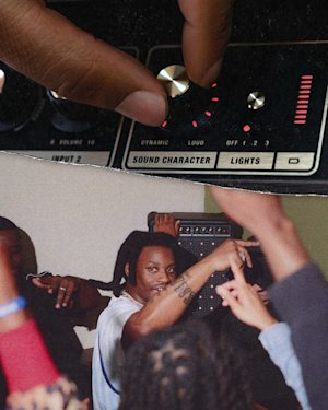 Adjusting a knob on the Marshall Bromley 750 party speaker above a lively dance scene, with people raising their arms and one looking toward the camera.