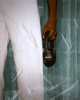 A person wearing the Marshall MONITOR II ANC headphones.