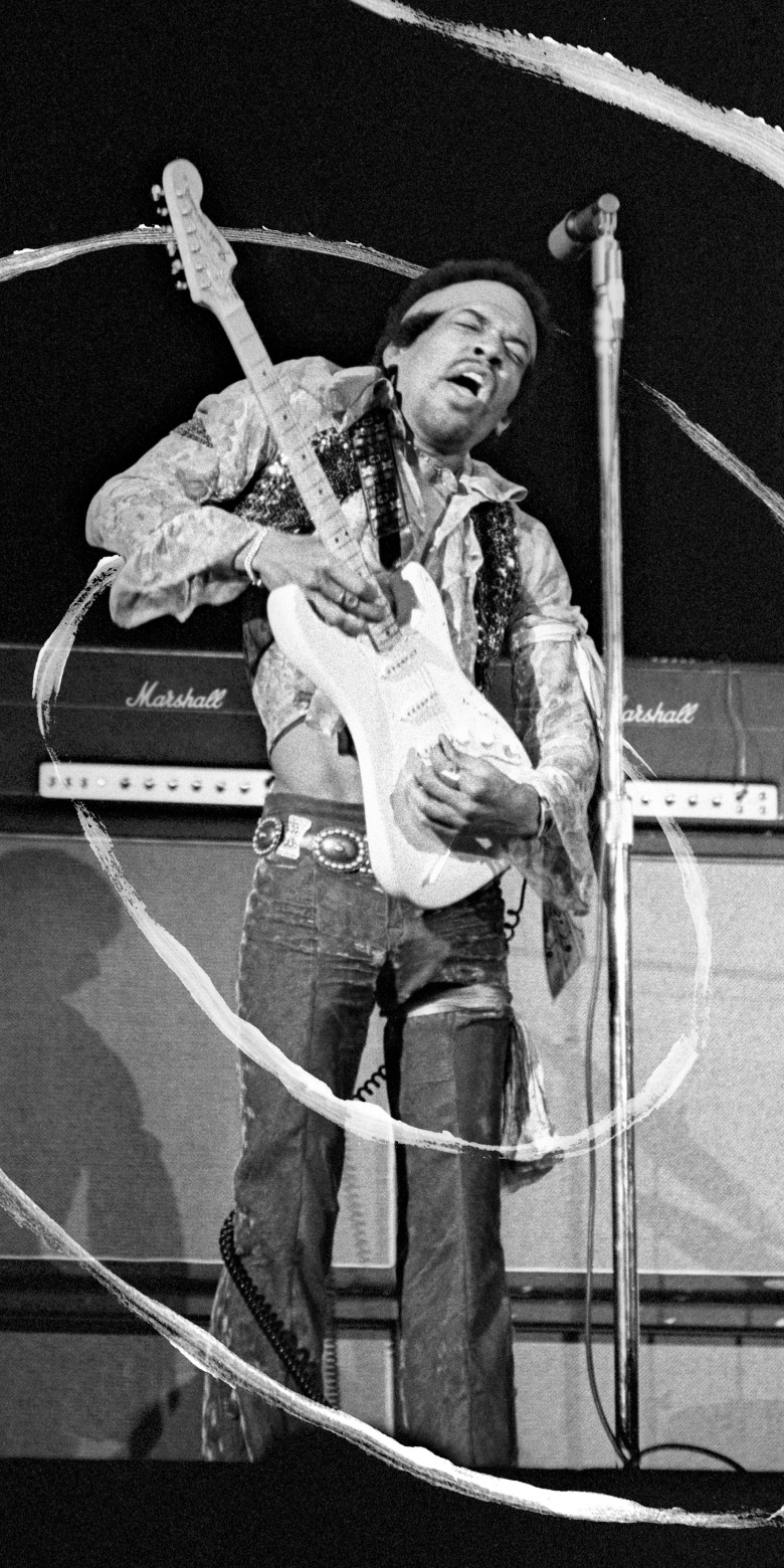 Jimmy Hendrix playing guitar in a Black and White photo.