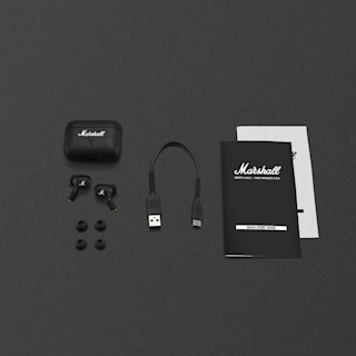 Marshall wireless Motif II A.N.C. earbuds set includes earbuds, charging case, USB cable, extra ear tips, quick start guide, and warranty card.