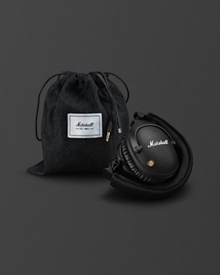 Monitor over-ear headphones next to a Marshall gift pouch.